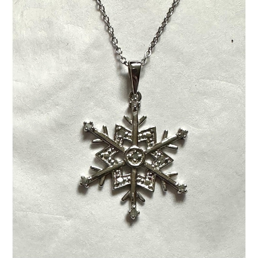 Sterling Silver And Diamond Snowflake Pendant Necklace
